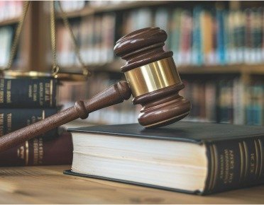 Judge’s gavel and law books representing family court legal services in Rawalpindi and Islamabad